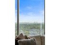 Stunning panoramic view of the city skyline and lush greenery from the window at 3630 Peachtree Ne Rd # 2009, Atlanta, GA 30326