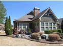 Picture of a home's backyard and patio featuring mature landscaping and hardscaped lounge area at 118 Cedarcrest Village Ct, Acworth, GA 30101