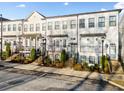 Charming townhomes with inviting entries, classic architectural details and landscaped front yards at 2018 Manchester Ne St, Atlanta, GA 30324