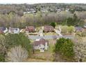Aerial shot of a home and neighborhood near wooded areas at 3920 Cain Mill Dr, Lithonia, GA 30038