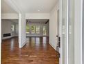 Bright and airy living room with hardwood floors, large windows, fireplace and an open floor plan at 482 Majestic Oaks Pl, Smyrna, GA 30082
