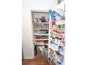 Walk in pantry with shelves providing storage for food, cookware and small appliances at 5400 Roswell Rd # K2, Atlanta, GA 30342