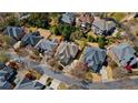 Aerial view of a residential neighborhood showing the property's location among well-maintained homes and tree-lined streets at 12800 Wyngate Trl, Alpharetta, GA 30005