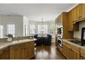 Eat-in kitchen features custom cabinetry and a bright breakfast nook with ample seating at 78 Crumley Se St, Atlanta, GA 30312