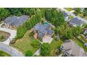 Luxury home with beautiful landscaping, pool, and sprawling green lawn at 1391 Harris Rd, Lawrenceville, GA 30043