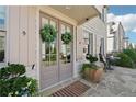 Charming entrance with double doors, stone patio and well-manicured landscaping at 204 N Esplanade, Alpharetta, GA 30009