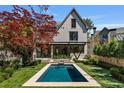 Backyard with a swimming pool and patio, perfect for outdoor entertaining at 96 The Prado Ne, Atlanta, GA 30309