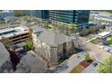 Aerial view showcases this condominium with manicured landscaping and nearby office buildings at 10 Perimeter Summit Ne Blvd # 1204, Brookhaven, GA 30319