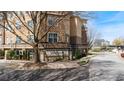 Villa Sonoma Condominiums signage is framed by mature trees and manicured lawns at 10 Perimeter Summit Ne Blvd # 1204, Brookhaven, GA 30319