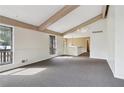 Bright living room with vaulted ceilings, exposed beams, and ample natural light at 3100 Meadow Dr, Marietta, GA 30062