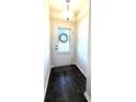 Entryway with wood floors and white walls at 3567 Hidden Valley Cir, Lawrenceville, GA 30044