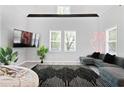 Stylish living room featuring contemporary decor, sleek furnishings, and abundant natural light at 514 English Nw Ave, Atlanta, GA 30318
