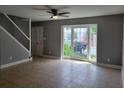 Inviting living room with neutral paint, tile floors, and bright bay window at 136 Peachtree Memorial Nw Dr # Ga8, Atlanta, GA 30309