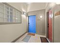 Neutral hallway featuring tile floors and updated lighting fixtures at 400 17Th Nw St # 1113, Atlanta, GA 30363
