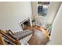 Grand foyer with hardwood floors, staircase, chandelier, and an abundance of natural light at 1562 Asheforde Dr, Marietta, GA 30068