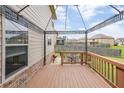 Cozy back deck with outdoor seating, perfect for relaxing or entertaining guests at 8097 White Oak Loop, Lithonia, GA 30038