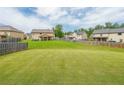 Spacious backyard, fully fenced, perfect for outdoor activities and entertaining at 8097 White Oak Loop, Lithonia, GA 30038