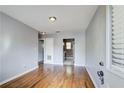 Hardwood floored living room with neutral paint and access to the kitchen at 561 Formwalt Sw St # 6, Atlanta, GA 30312