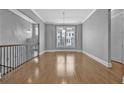 Elegant dining room with hardwood floors and ample natural light at 2094 Callaway Nw Ct, Atlanta, GA 30318