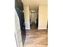 Inviting entryway with wood-look tile flooring leading into the home at 5050 Martins Crossing Rd, Stone Mountain, GA 30088
