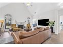 Spacious living room with a fireplace, comfortable seating, wood flooring and ample natural light at 2250 Snug Ne Hbr, Marietta, GA 30066