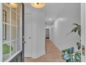 View of the entryway leading into the house with tiled flooring and natural light at 1506 Knights Trl, Stone Mountain, GA 30083