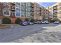 Apartment building with multiple floors and balconies with ample parking at 898 Oak Sw St # 1101, Atlanta, GA 30310