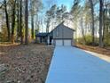 Charming two-story home with a two-car garage and unique architectural details at 3814 Whaley Ct, Snellville, GA 30039