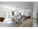 Bright and airy living room with natural light, modern furnishings, and open floor plan at 3336 Myrtle St, Atlanta, GA 30354
