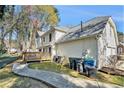 Backyard featuring a wooden deck and a view of the home's exterior at 5110 Montcalm Sw Dr, Atlanta, GA 30331