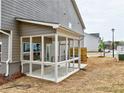 Covered back porch featuring white frames, concrete floors, and an open view at 1397 Fern Ridge Ct # 34, Norcross, GA 30093