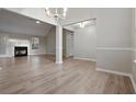 Spacious living room with wood floors and natural light at 4625 Thermal Ct, Douglasville, GA 30135
