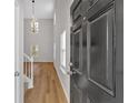 Bright entryway with hardwood floors, complemented by high ceilings and natural light at 3417 Sable Chase Ln, Atlanta, GA 30349