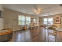 Bright living room with hardwood floors, neutral walls, and natural light streaming through the windows at 3540 Victoria St, Atlanta, GA 30337