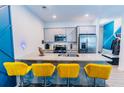 Modern kitchen with granite countertops, stainless steel appliances, and breakfast bar at 3132 Meadowstone Sw Ln, Atlanta, GA 30331