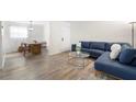 Open-concept floor plan showing living room and dining area at 89 De Arc Nw Pl, Atlanta, GA 30327