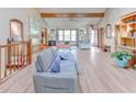 Spacious living room with vaulted ceilings, wood beams, and lots of natural light at 730 Ponderosa Ct, Fayetteville, GA 30214