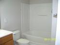 Full bathroom with a toilet, and shower/tub combo, and a vanity at 2787 Deerwood Sw Ln, Atlanta, GA 30331