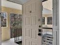 View through an open doorway to the outside, balcony, stairs and trees at 810 Lismore Se # 10, Smyrna, GA 30080