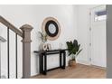 Stylish entryway featuring a decorative mirror, modern console table, and neutral decor at 1249 Ladd Sw St, Atlanta, GA 30310