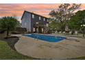 Backyard features an inviting in-ground pool with a spacious deck, perfect for outdoor entertaining at 105 Oakfield Way, Douglasville, GA 30134