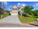 Beautiful two-story home with a well-maintained lawn and an inviting front yard at 3048 Level Grove Ln, Dacula, GA 30019