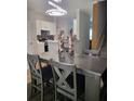 Cozy dining area with stylish table and modern light fixture, adjacent to kitchen at 1731 Pryor Sw Rd # 108, Atlanta, GA 30315