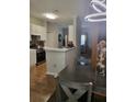 Bright kitchen features white cabinetry, a breakfast bar, and stainless steel appliances at 1731 Pryor Sw Rd # 108, Atlanta, GA 30315