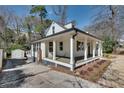 Beautiful home with covered porch, white columns and convenient parking space at 1861 Dyer Cir, Atlanta, GA 30341