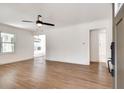 Spacious living room with hardwood floors, neutral paint and a ceiling fan at 1861 Dyer Cir, Atlanta, GA 30341