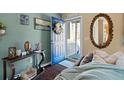 Cozy entryway with stylish decor, a mirror, and a view to the outside at 170 Cobblestone Ct, Douglasville, GA 30134