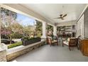 Relaxing front porch with comfortable seating, a ceiling fan, and picturesque views of the landscaped surroundings at 637 Linwood Ne Ave, Atlanta, GA 30306