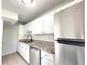 Kitchen featuring stainless steel appliances, granite countertops, and tiled backsplash at 3156 Nectarine Cir, Decatur, GA 30034