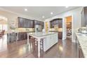 Spacious kitchen featuring granite countertops, stainless steel appliances, and ample cabinet space at 1438 Kings Park Nw Dr, Kennesaw, GA 30152